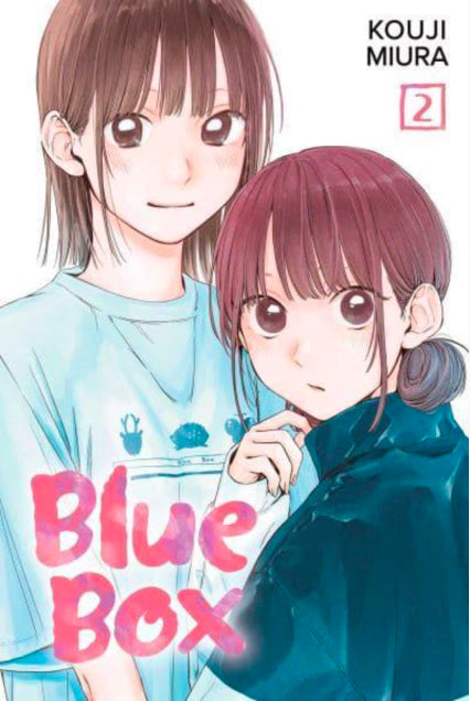 Engelstalige cover van Blue Box Vol. 2, met Taiki Inomata en Chinatsu Kano in een sportieve en alledaagse schoolsetting, die de mix van romantiek en sport in de manga weerspiegelt, getekend in een zachte en moderne manga-stijl.